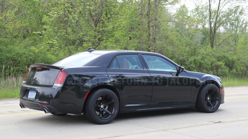 Illustration for article titled What The Hell Is This Widebody Chrysler 300 SRT With Dodge Demon Wheels?